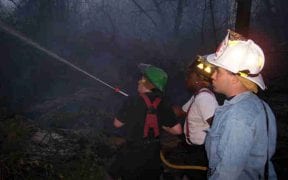 The Good-Will Fire Department battled a large brush fire for over four hours in a heavily wooded area off Route 17K just west of the city line on 4/20/06. Chief Michael Decker led the incident, calling for assistance from the Orange Lake, Winona Lake, City of Newburgh, Middlehope, Cronomer Valley, Coldenham and Vail’s Gate Fire Departments. The New Windsor Fire Department stood by at Good-Will while Marlboro stood by for Middlehope. (Photos by Jim Bakun)