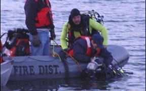 In October of 2003, the Good-Will and Vail's Gate Fire Departments were dispatched to a report of a truck that had gone off the road and into the north end of Washington Lake near Home Depot in the Good-Will Fire District. Chief Warren Decker arrived on the scene and requested a dive team from the Monroe Mombasha Fire Company and a second boat from Cronomer Valley. Divers located the truck under water and verified there were no additional occupants. (Photos by David Weimer, Jr. / Firehouse Magazine)